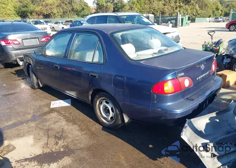2002 Toyota Corolla Ce из США, поврежденный, VIN 2T1BR12E42C569195